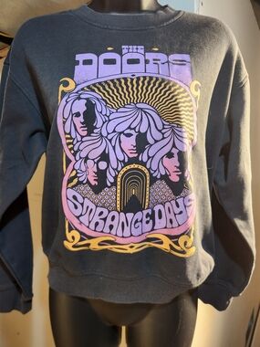 Divided Black Crewneck Sweatshirt with Purple & Gold Psychedelic Print